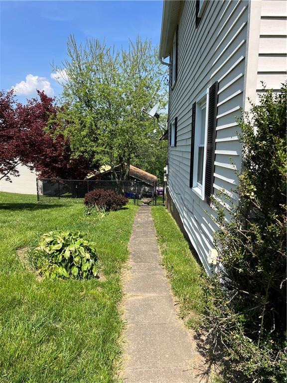 9155 Maple Street Pittsburgh, PA 15239 - Photo 10 of 16 a view of a back yard of the house