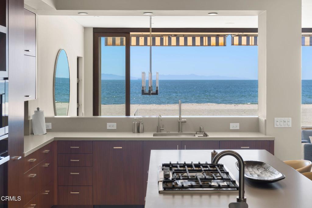 1409 Marine Way Oxnard, CA 93035 - Photo 13 of 58 a bathroom with a sink and a mirror