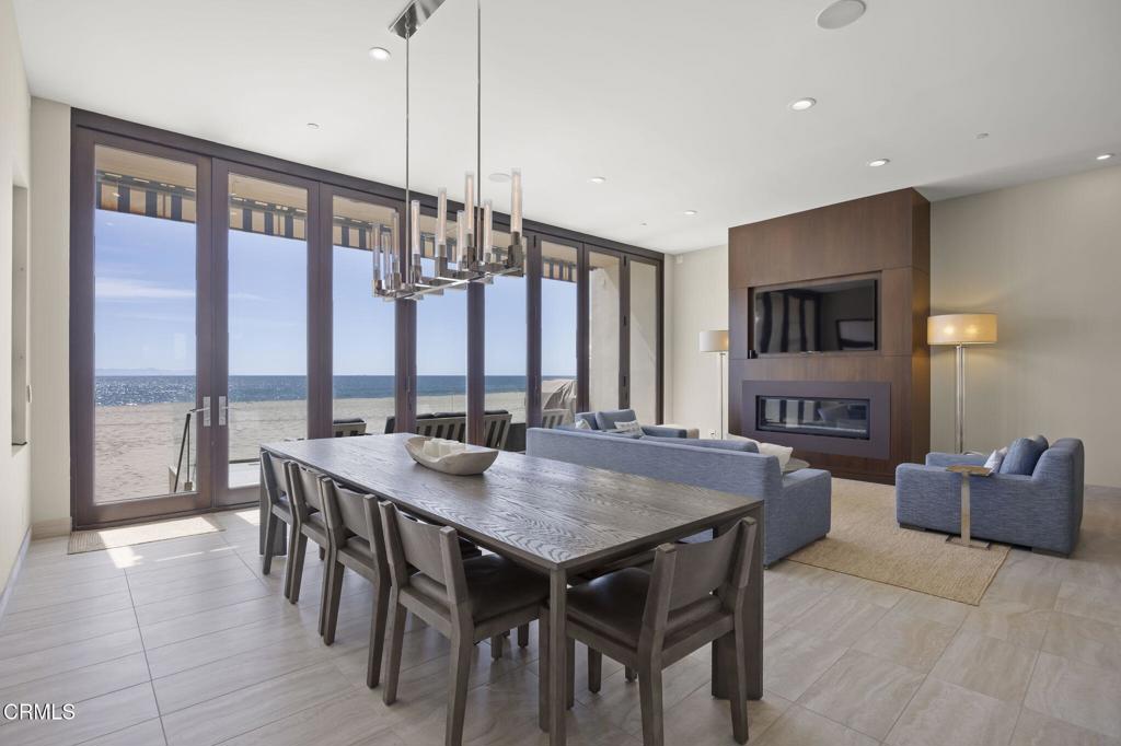 1409 Marine Way Oxnard, CA 93035 - Photo 17 of 58 a view of a dining room with furniture window and wooden floor