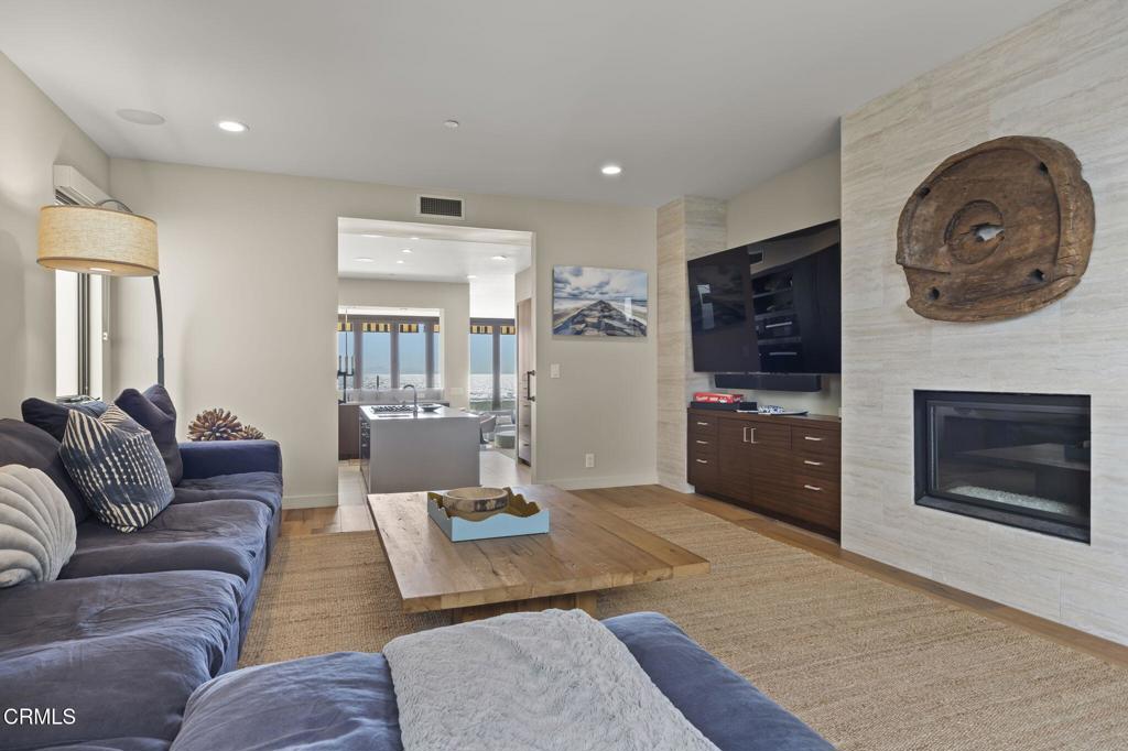 1409 Marine Way Oxnard, CA 93035 - Photo 19 of 58 a living room with furniture and a fireplace