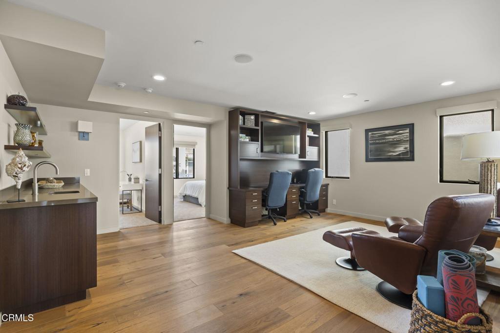 1409 Marine Way Oxnard, CA 93035 - Photo 23 of 58 a living room with furniture window and a wooden floor