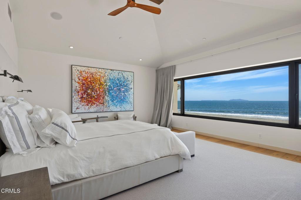 1409 Marine Way Oxnard, CA 93035 - Photo 29 of 58 a bedroom with a large bed and a large window