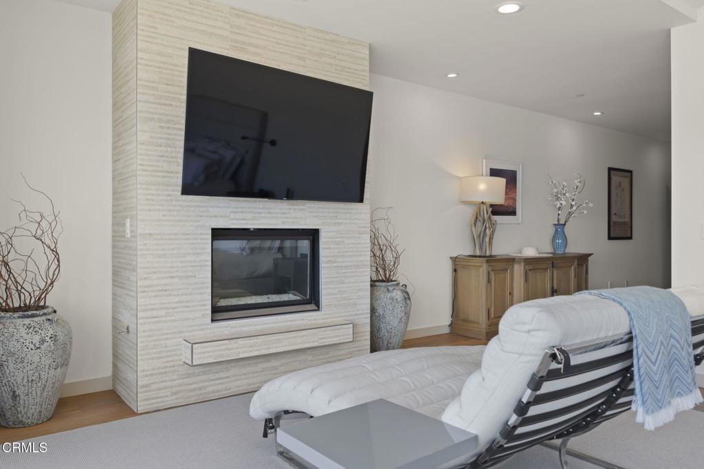 1409 Marine Way Oxnard, CA 93035 - Photo 36 of 58 a living room with furniture and a fireplace
