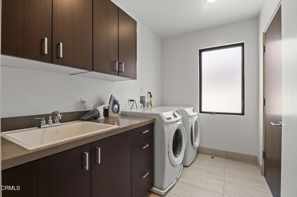 1409 Marine Way Oxnard, CA 93035 - Photo 38 of 58 a utility room with sink dryer and washer