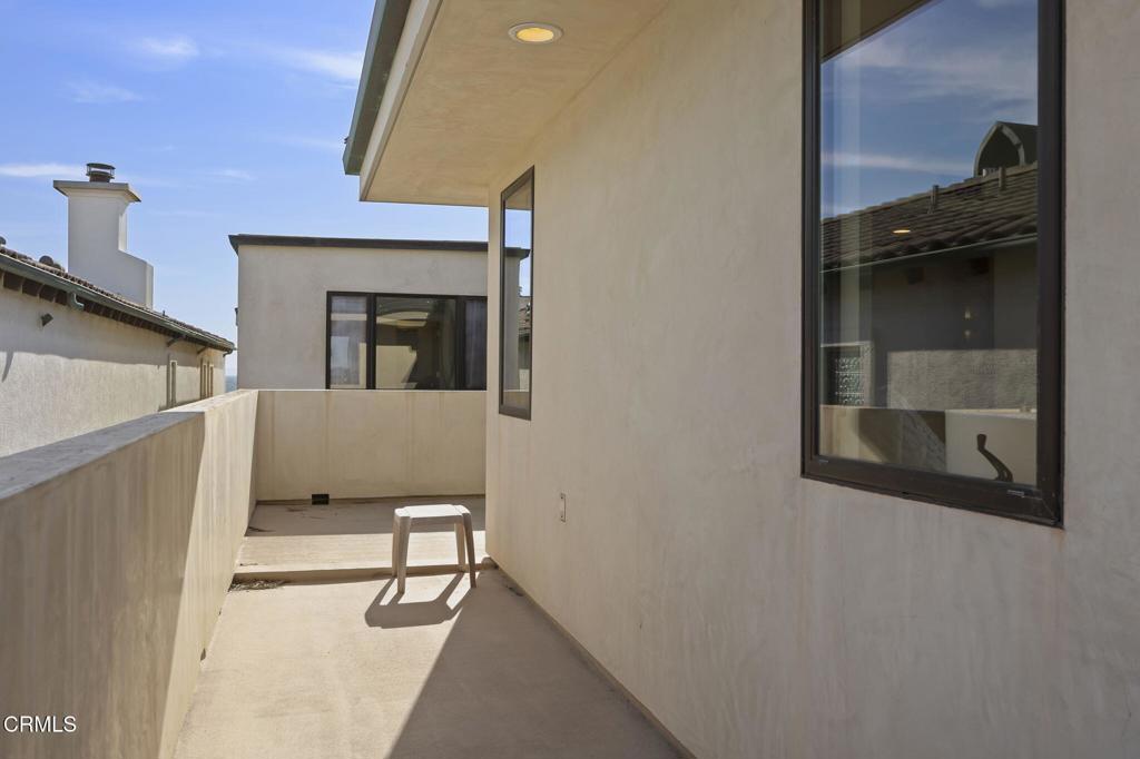1409 Marine Way Oxnard, CA 93035 - Photo 45 of 58 a view of a door and chair in the room