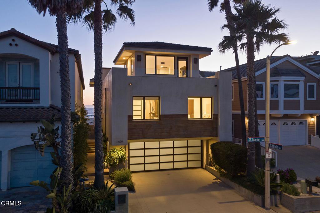 1409 Marine Way Oxnard, CA 93035 - Photo 52 of 58 a front view of a house with a yard