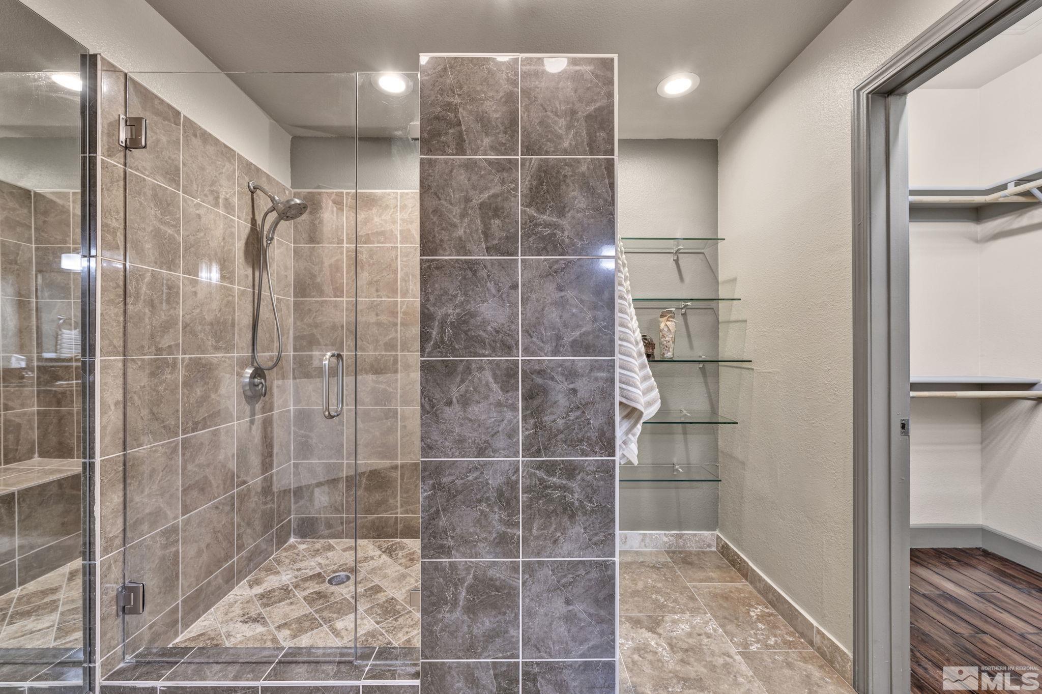 17000 Wedge Parkway, Unit 3422 Reno, NV 89511 - Photo 18 of 39 a bathroom with a shower