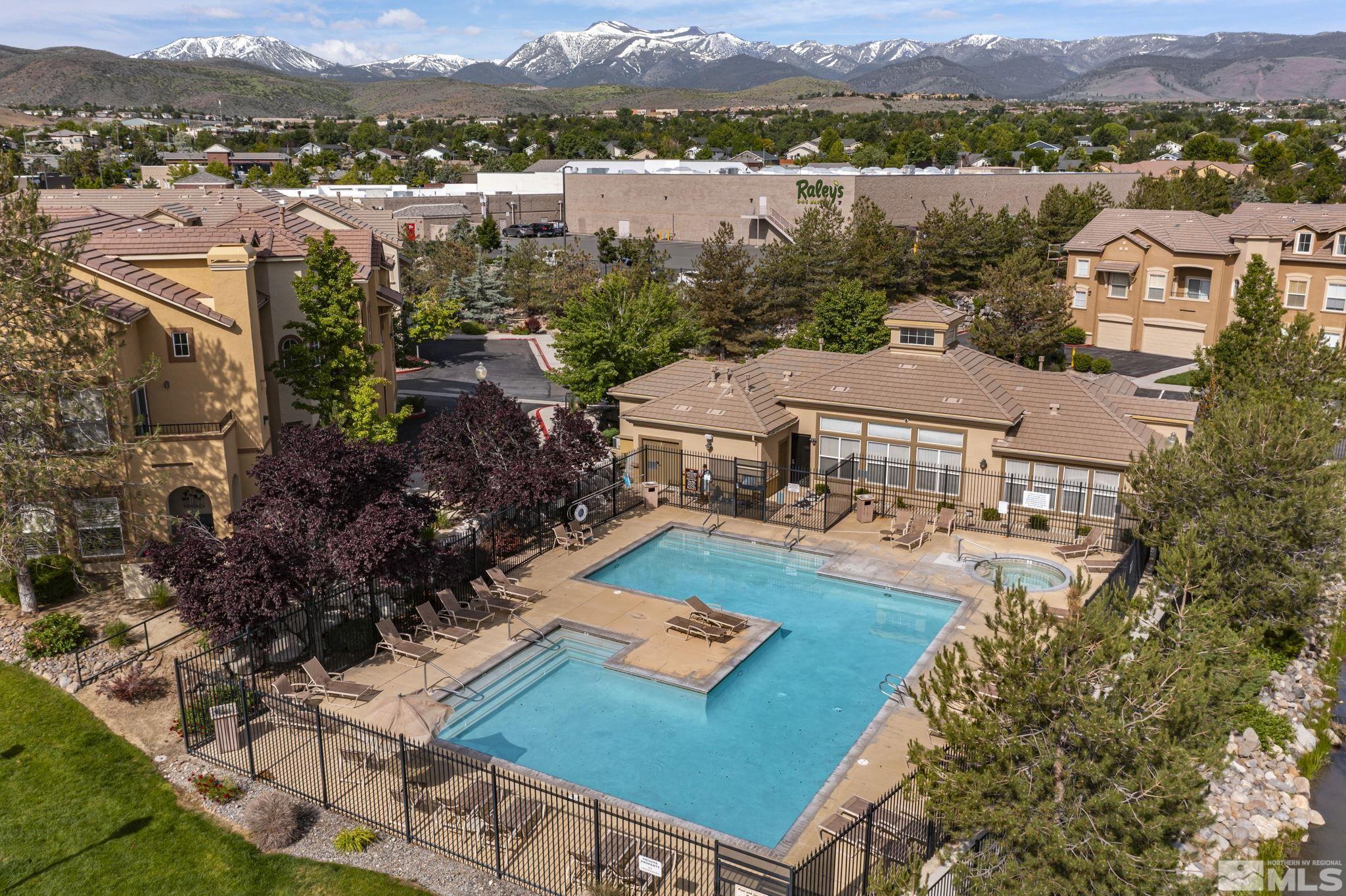 17000 Wedge Parkway, Unit 3422 Reno, NV 89511 - Photo 38 of 39 an aerial view of house with yard swimming pool and ocean view