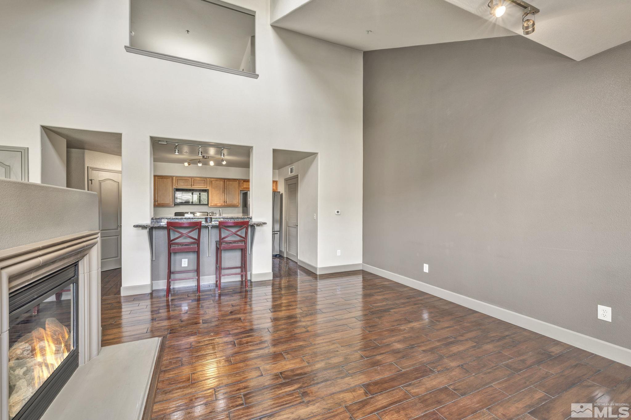 17000 Wedge Parkway, Unit 3422 Reno, NV 89511 - Photo 7 of 39 a view of a livingroom with furniture and a fireplace