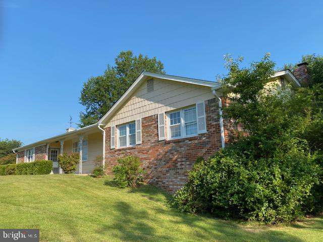 37740 Apache Road Charlotte Hall, MD 20622 - Photo 3 of 22 Left side of house