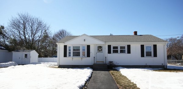 1 Whitcomb Road East Providence, RI 02915 - Photo 1 of 9 a front view of a house with a yard
