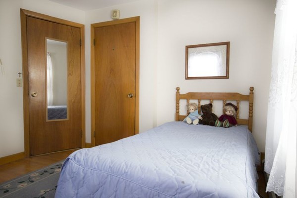 1 Whitcomb Road East Providence, RI 02915 - Photo 5 of 9 a bedroom with a bed and a window
