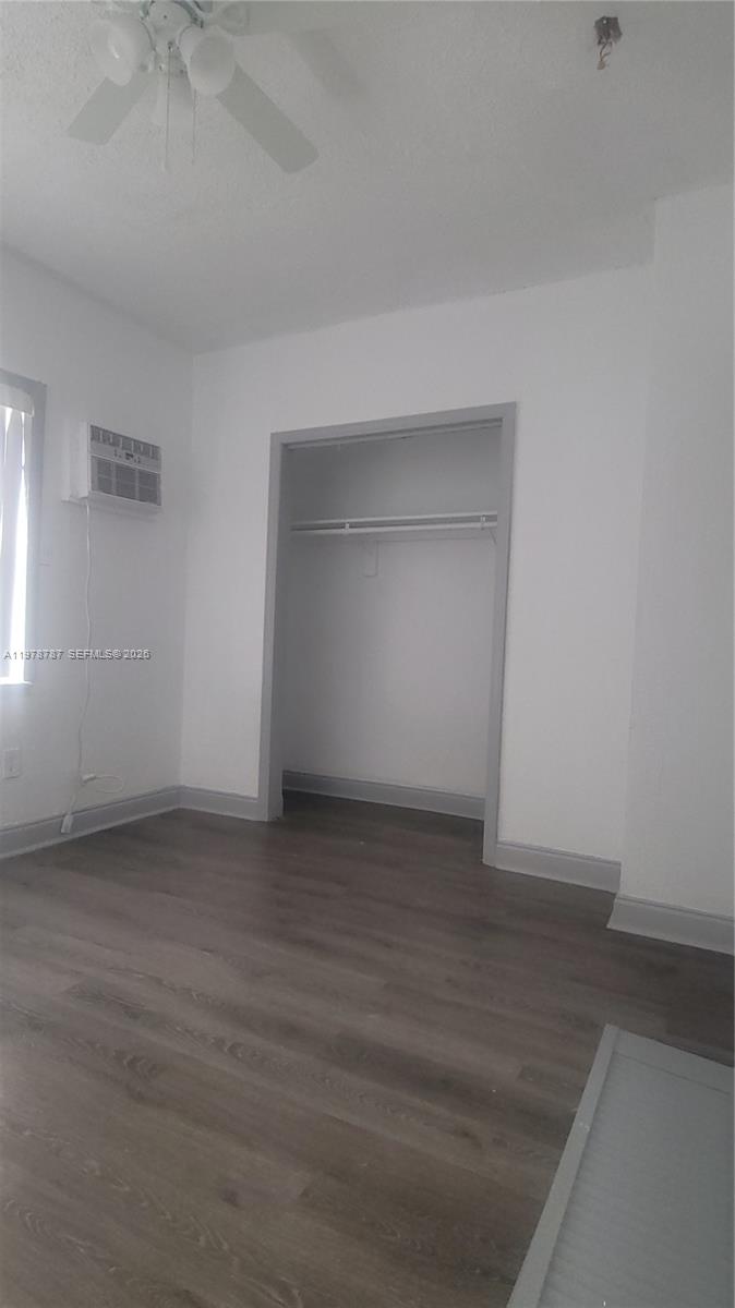 1322 Southwest 7th Street, Unit 4 Miami, FL 33135 - Photo 11 of 15 a view of an empty room and wooden floor
