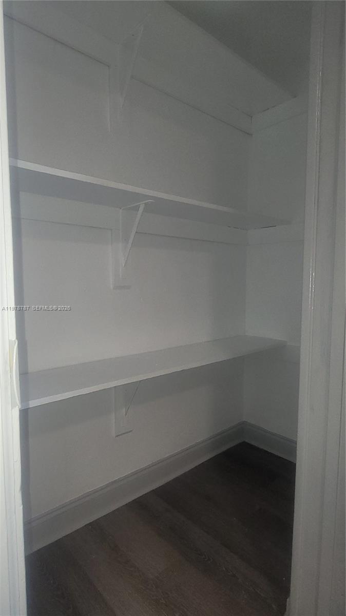 1322 Southwest 7th Street, Unit 4 Miami, FL 33135 - Photo 15 of 15 a empty closet with an empty space