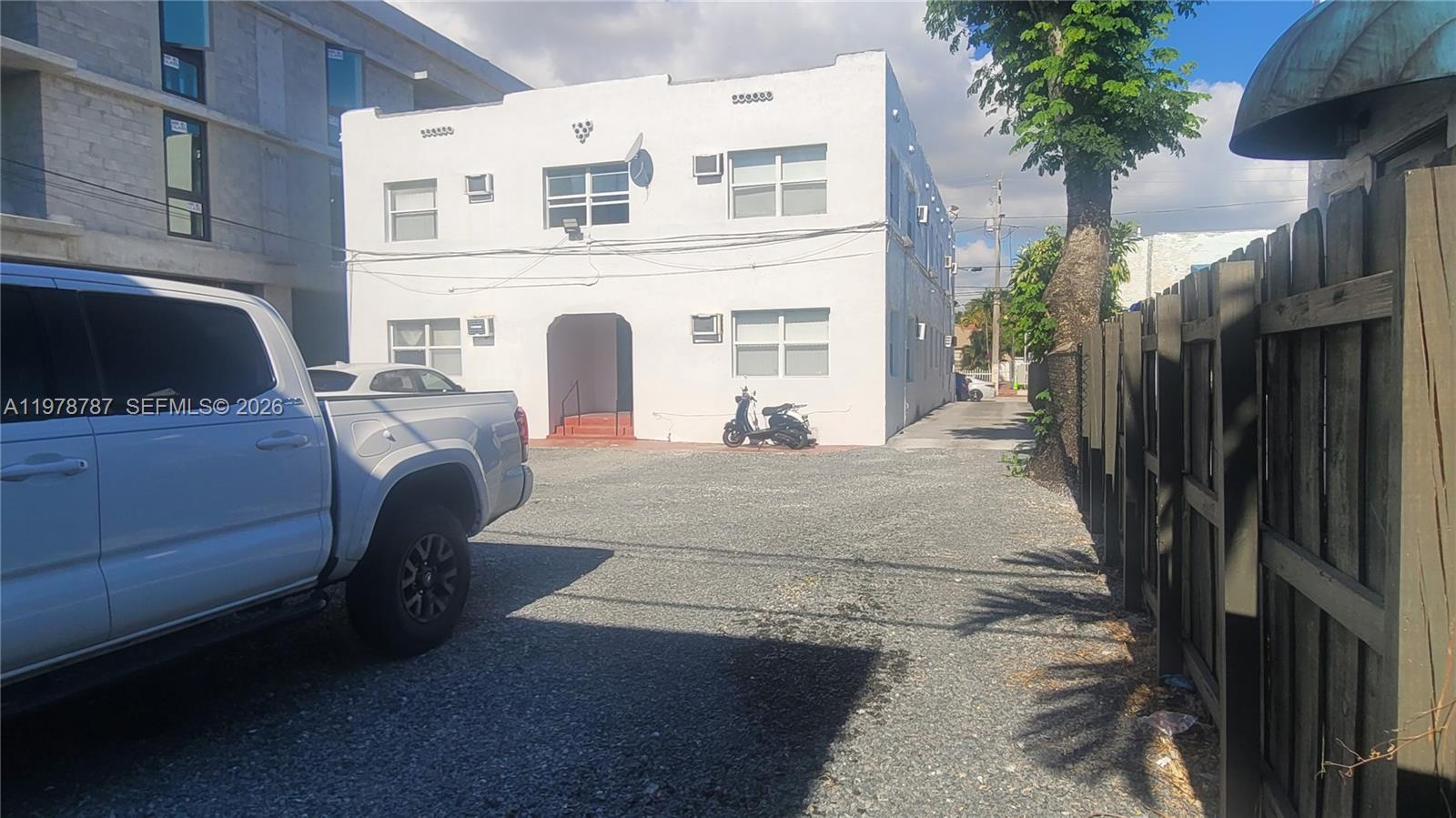 1322 Southwest 7th Street, Unit 4 Miami, FL 33135 - Photo 8 of 15 a view of a house with a sink and a car parked in front of it