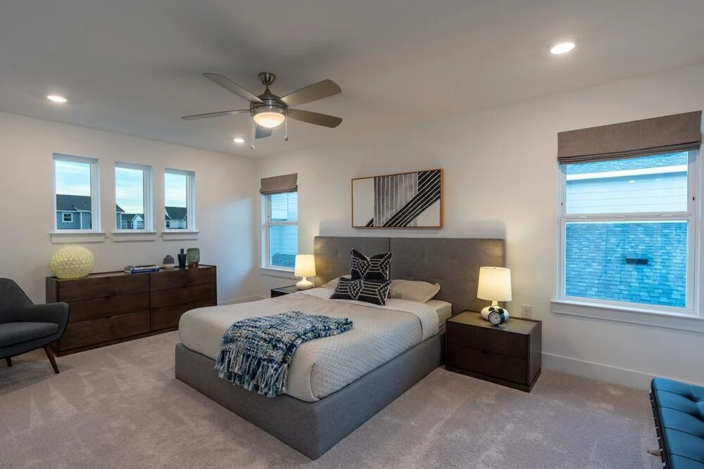 9504 Hamadryas Drive Austin, TX 78744 - Photo 12 of 23 a bedroom with a bed and furniture