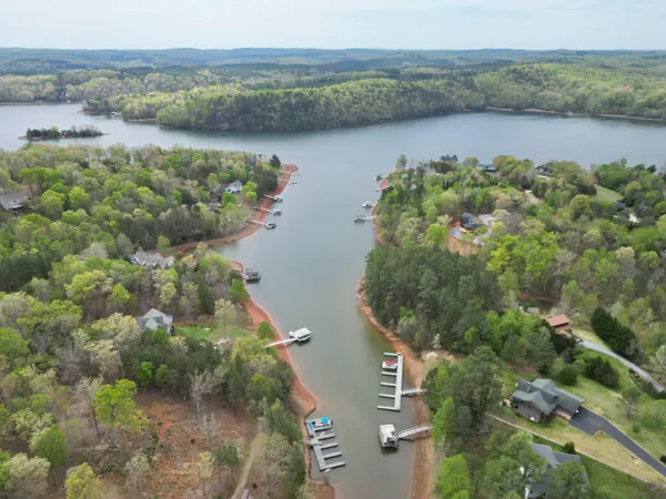 an aerial view of mountain with lake view