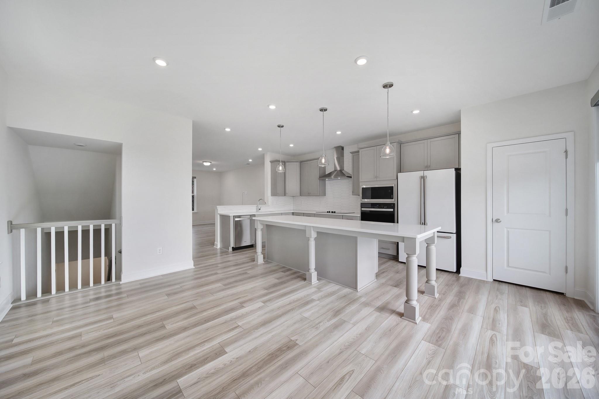 643 District Court Fort Mill, SC 29708 - Photo 11 of 43 a view of kitchen with wooden floor and electronic appliances