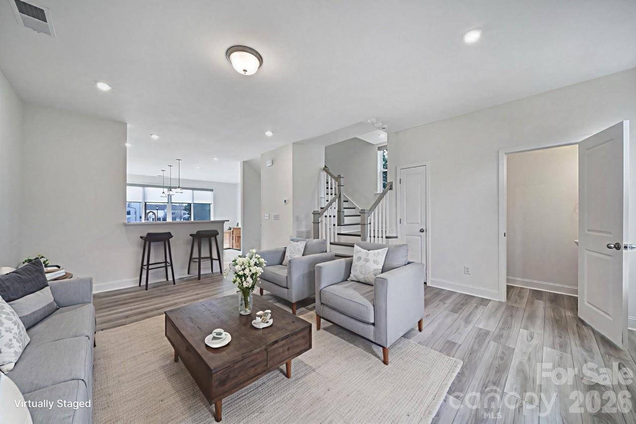 643 District Court Fort Mill, SC 29708 - Photo 17 of 41 a living room with furniture and a wooden floor