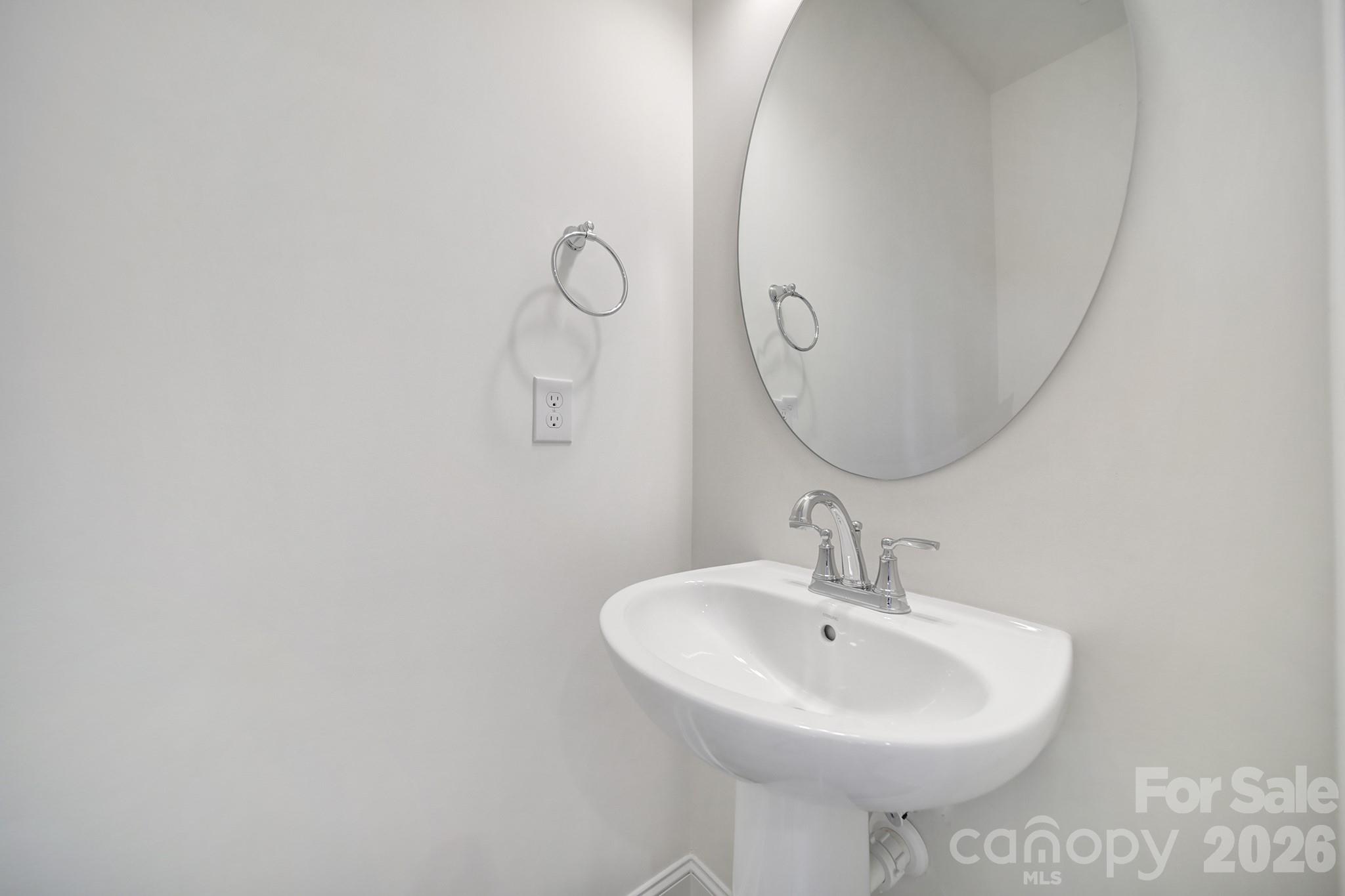 643 District Court Fort Mill, SC 29708 - Photo 18 of 41 a bathroom with a sink and a mirror