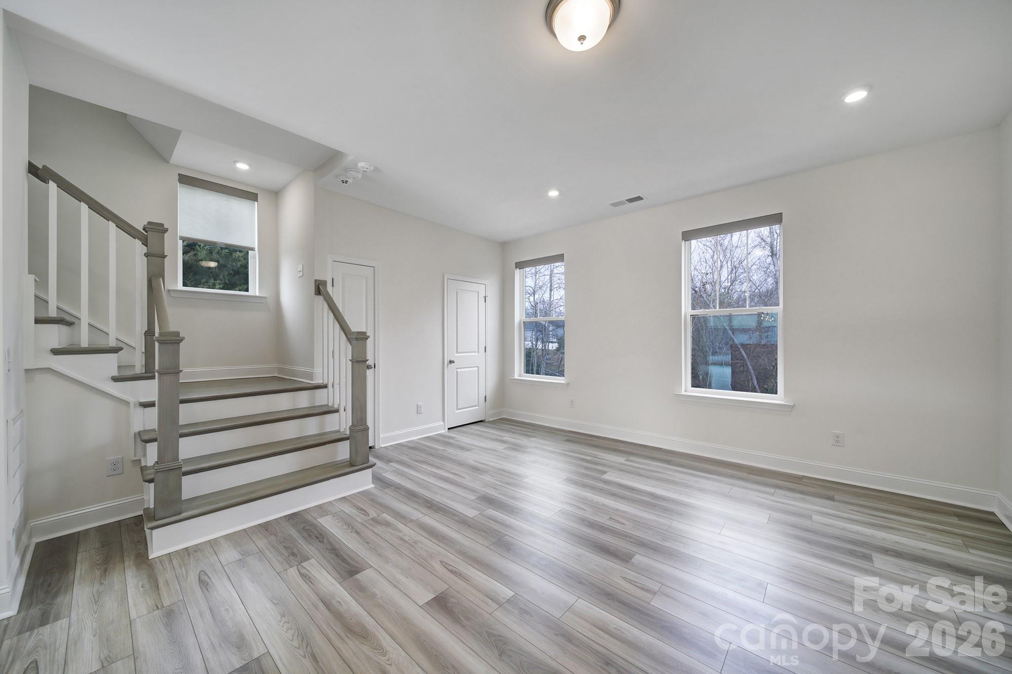 643 District Court Fort Mill, SC 29708 - Photo 19 of 41 wooden floor in an empty room with a window