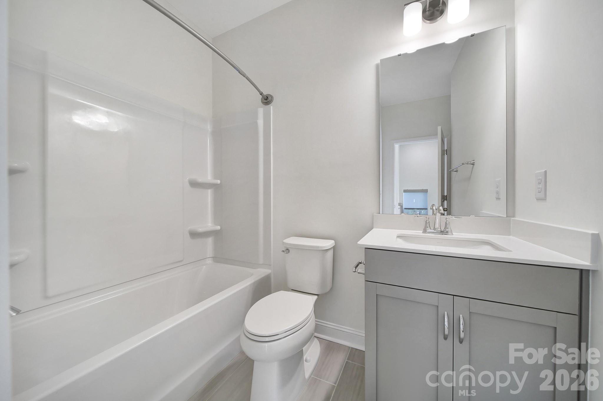643 District Court Fort Mill, SC 29708 - Photo 25 of 41 a bathroom with a sink a toilet and shower