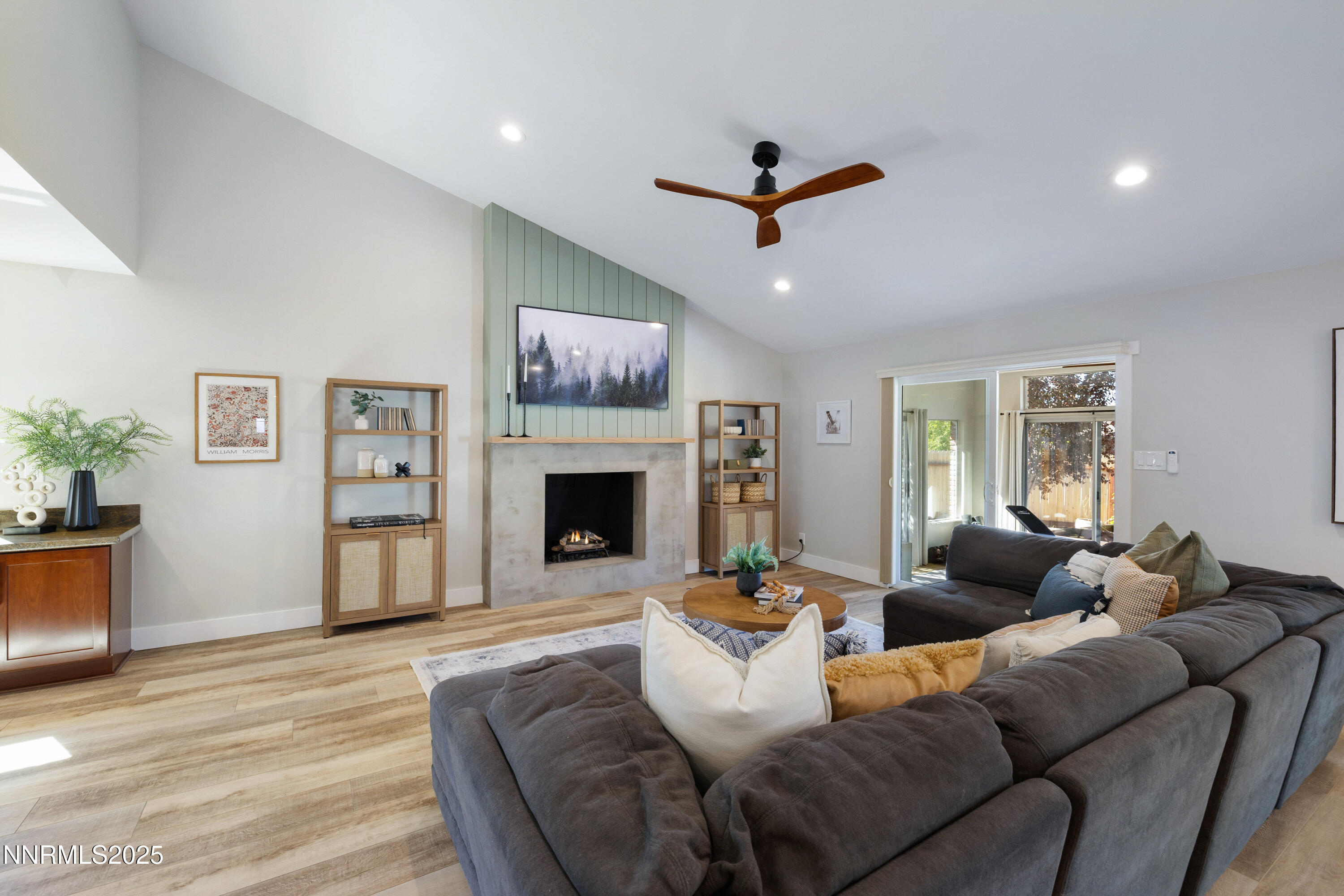 1401 Monroe Street Reno, NV 89509 - Photo 11 of 43 a living room with furniture and a fireplace