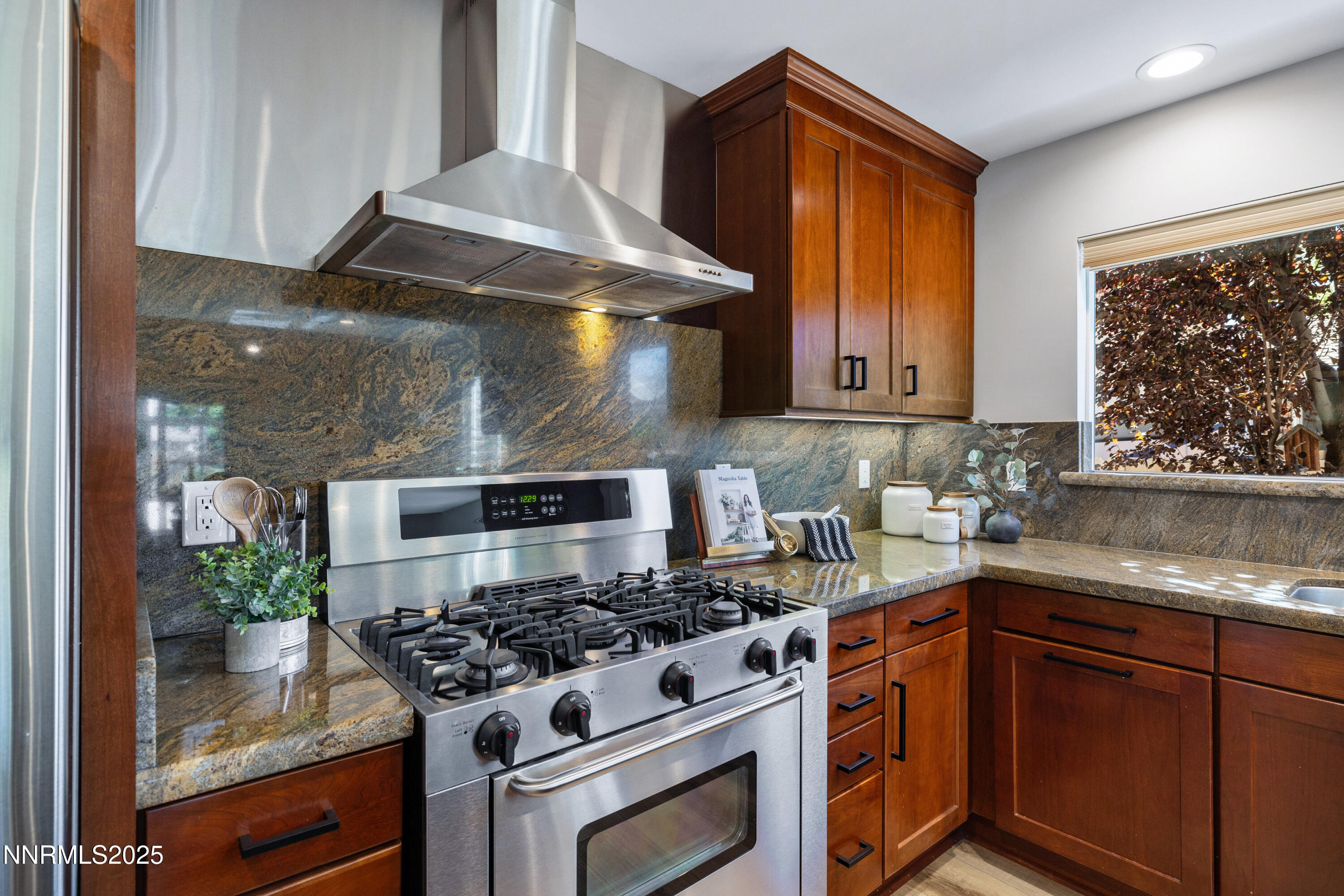 1401 Monroe Street Reno, NV 89509 - Photo 13 of 43 a kitchen with a stove and a sink