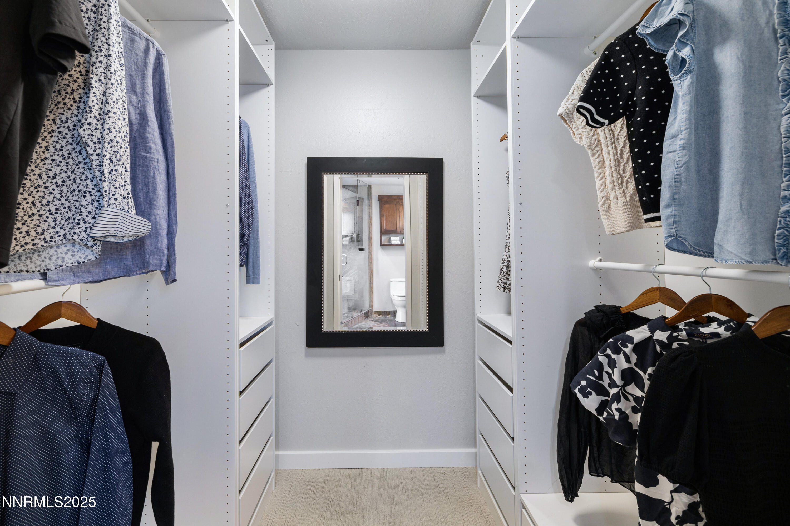1401 Monroe Street Reno, NV 89509 - Photo 19 of 43 a view of walk in closet with clothes and shoes