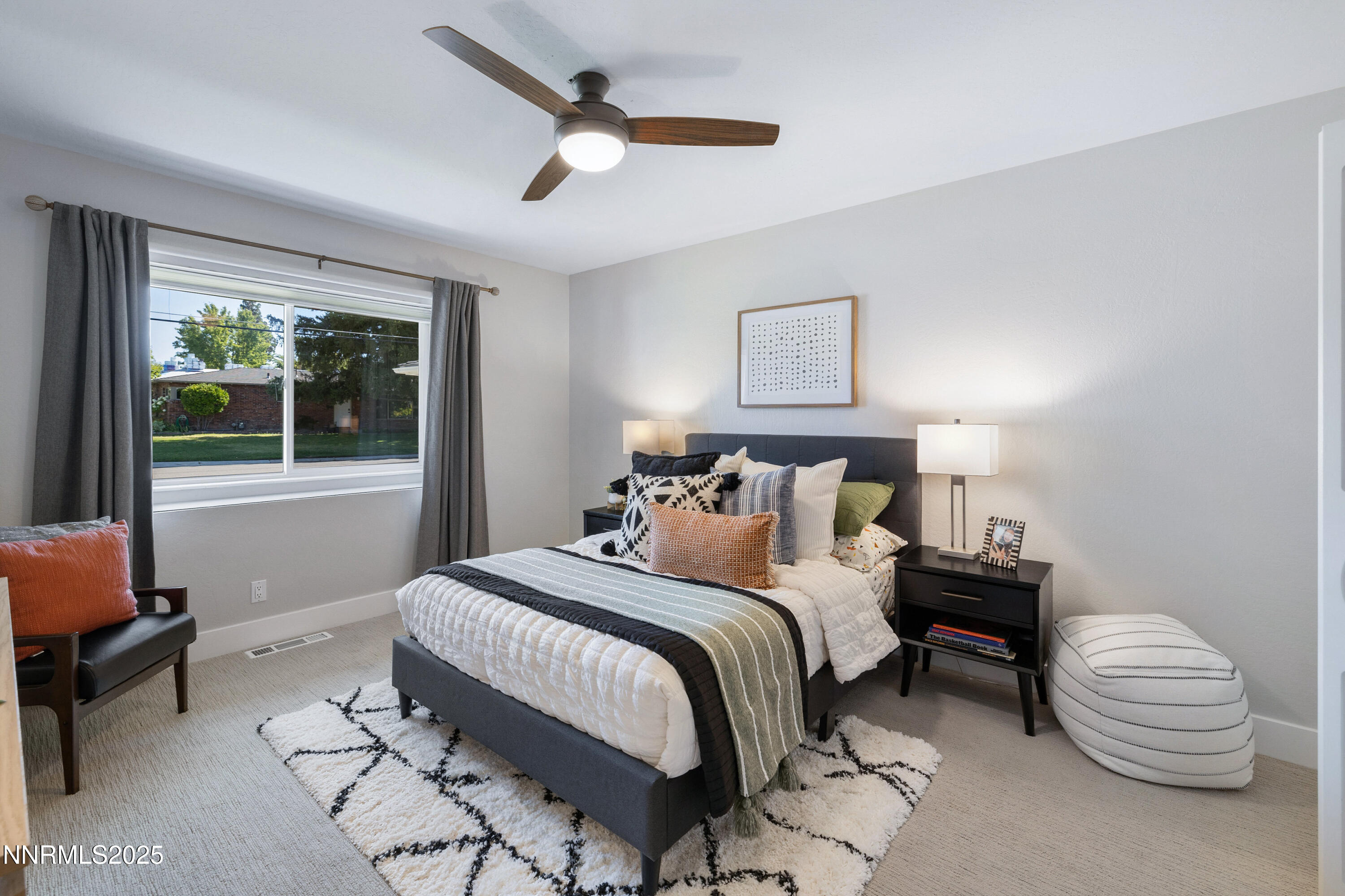 1401 Monroe Street Reno, NV 89509 - Photo 21 of 43 a bedroom with a bed and a window
