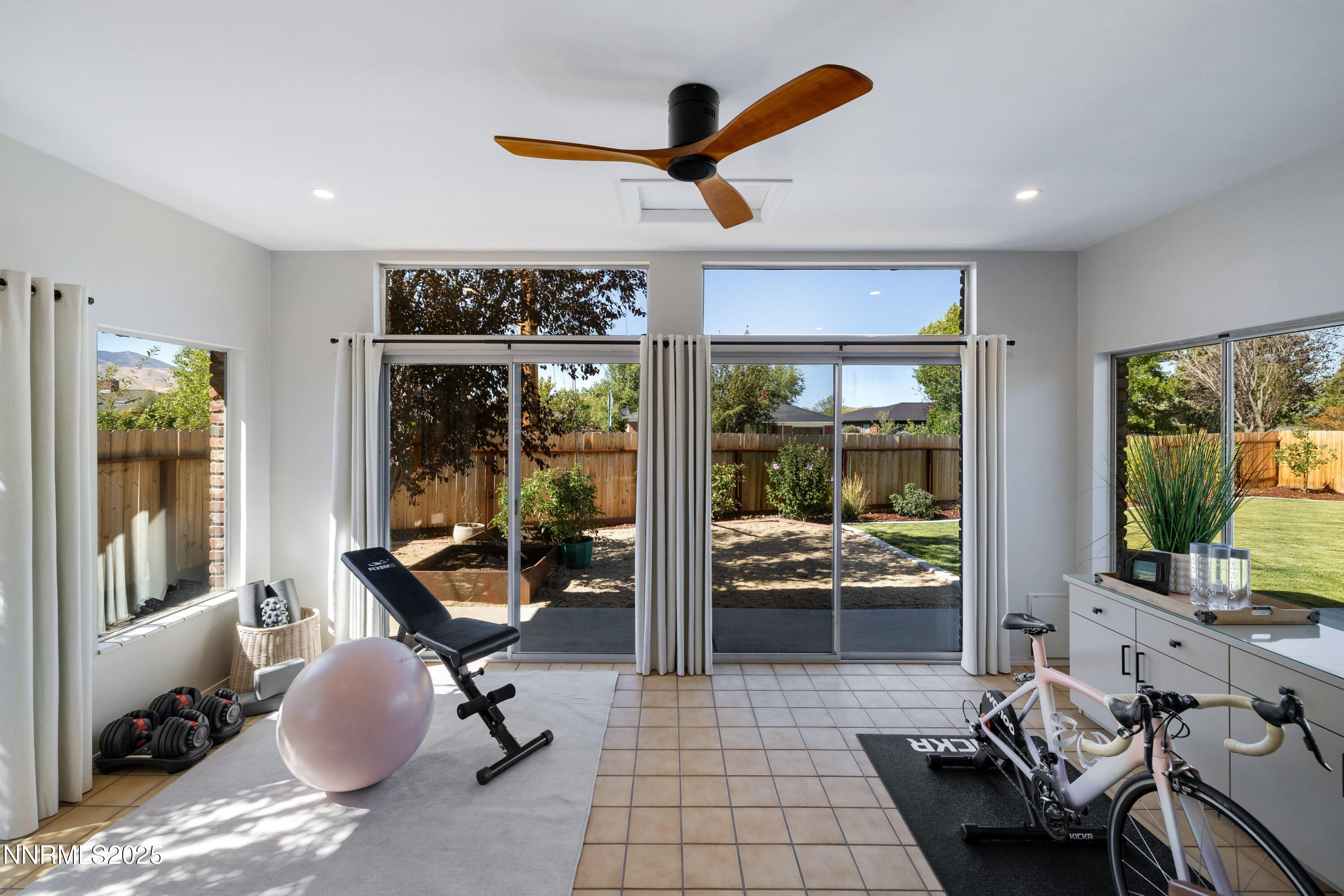 1401 Monroe Street Reno, NV 89509 - Photo 27 of 43 a view of a livingroom with furniture and floor to ceiling window
