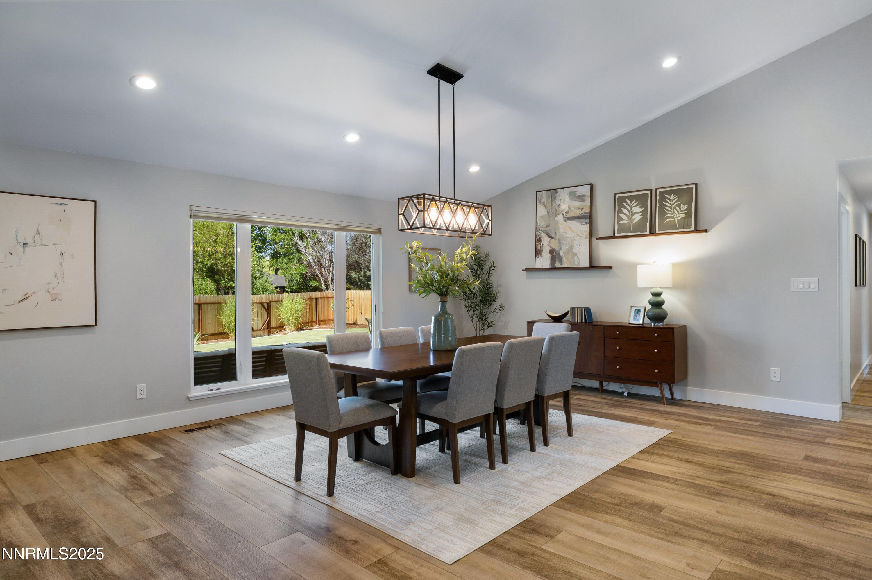1401 Monroe Street Reno, NV 89509 - Photo 3 of 43 a view of a dining room with furniture window and wooden floor