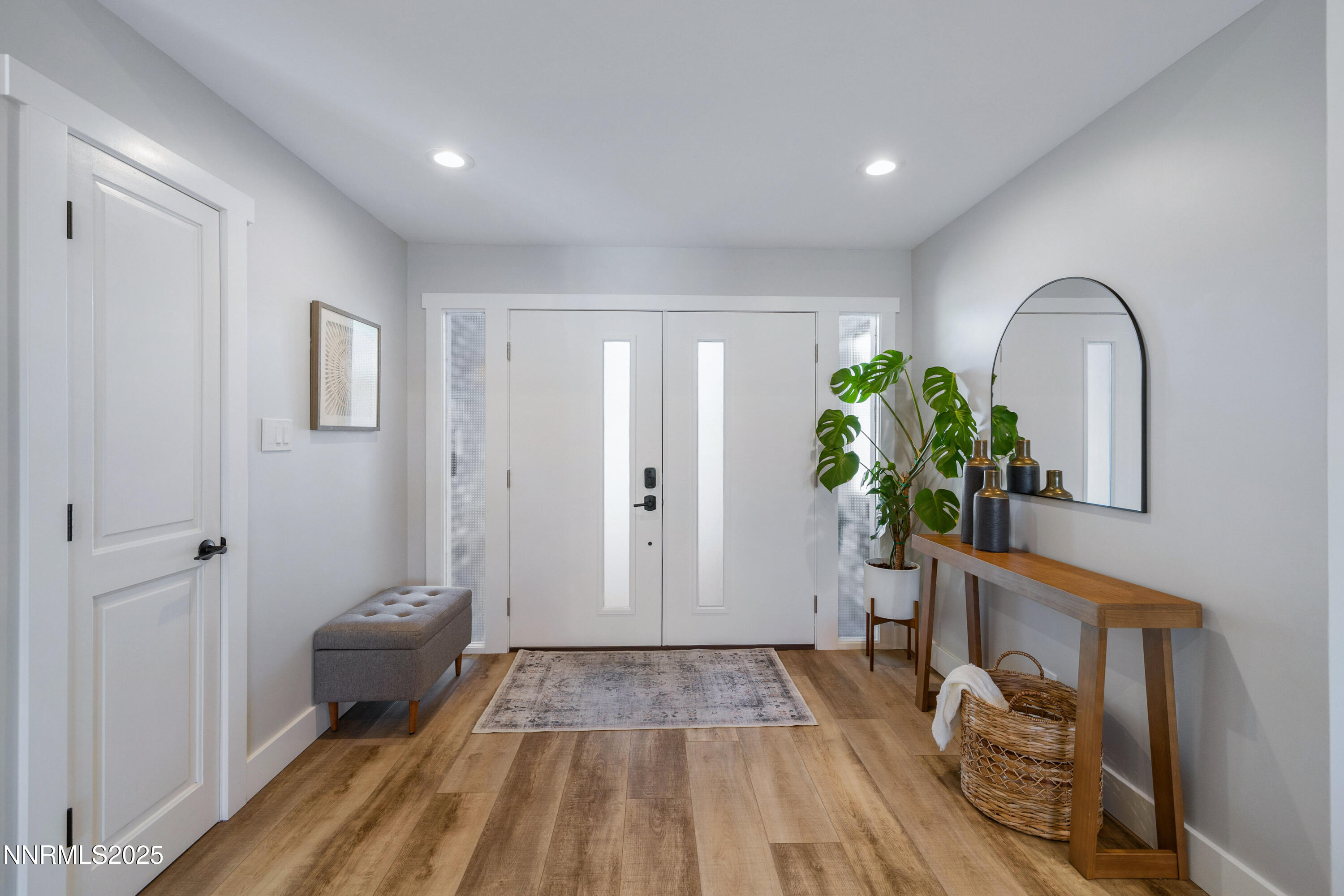 1401 Monroe Street Reno, NV 89509 - Photo 6 of 43 a view of a hallway with wooden floor and a potted plant