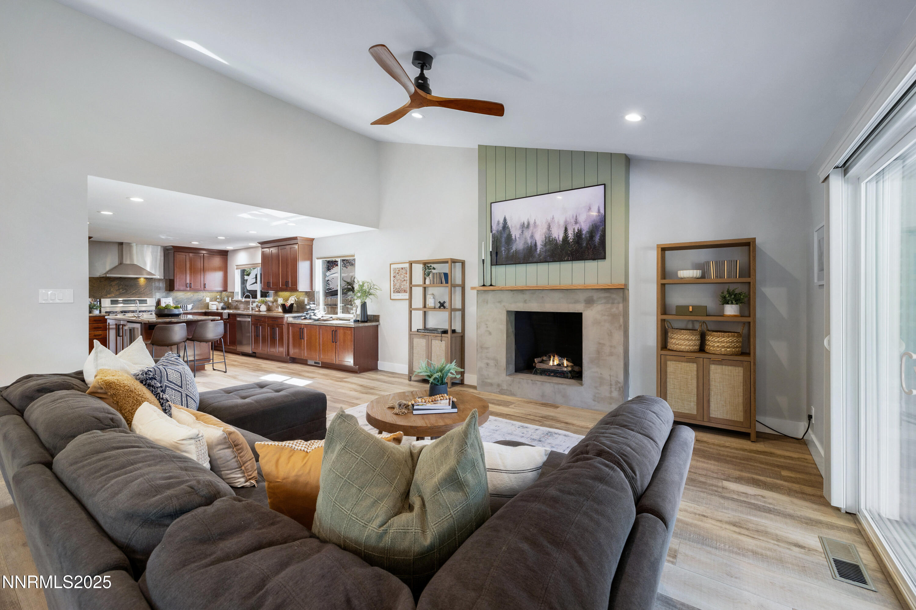1401 Monroe Street Reno, NV 89509 - Photo 7 of 43 a living room with furniture and a fireplace