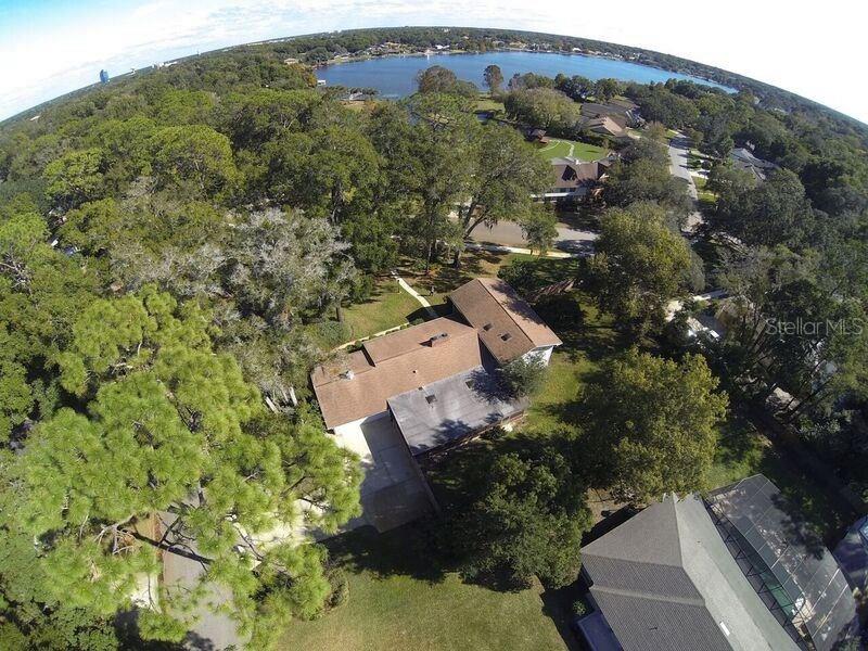 900 Spring Valley Road Altamonte Springs, FL 32714 - Photo 4 of 25 Aerial of House & Lake