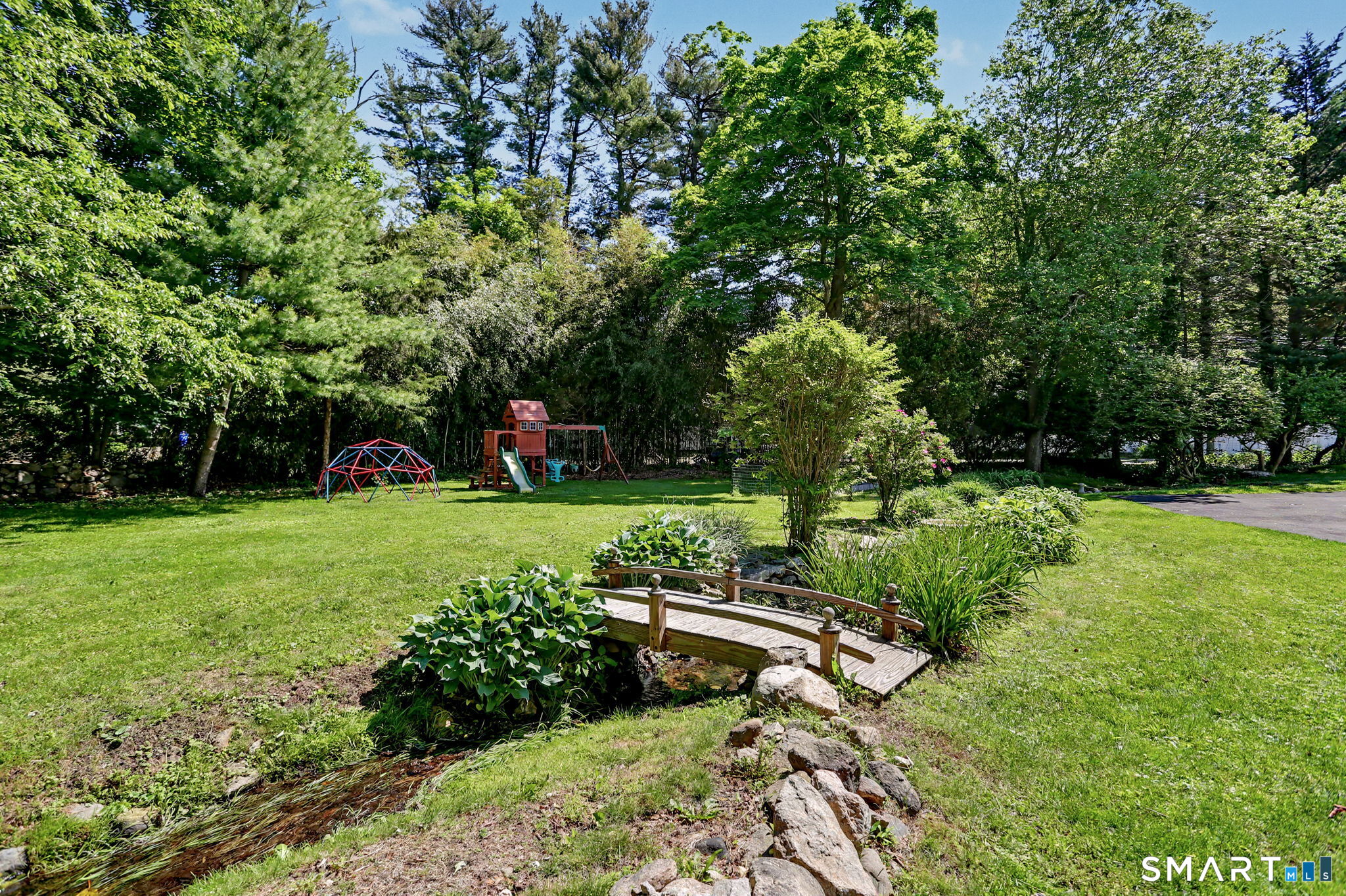 2 Rising Road Norwalk, CT 06850 - Photo 28 of 33 a view of a park with large trees
