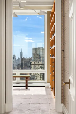 a view of a city from a hallway