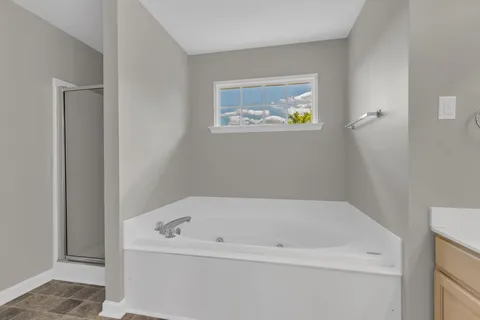 a view of a bathtub in a bathroom