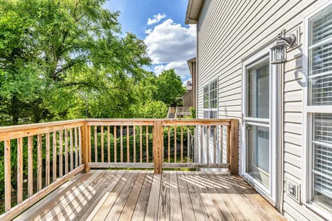 a view of a wooden street from a balcony