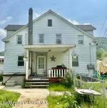 a view of a house with backyard tub and couches