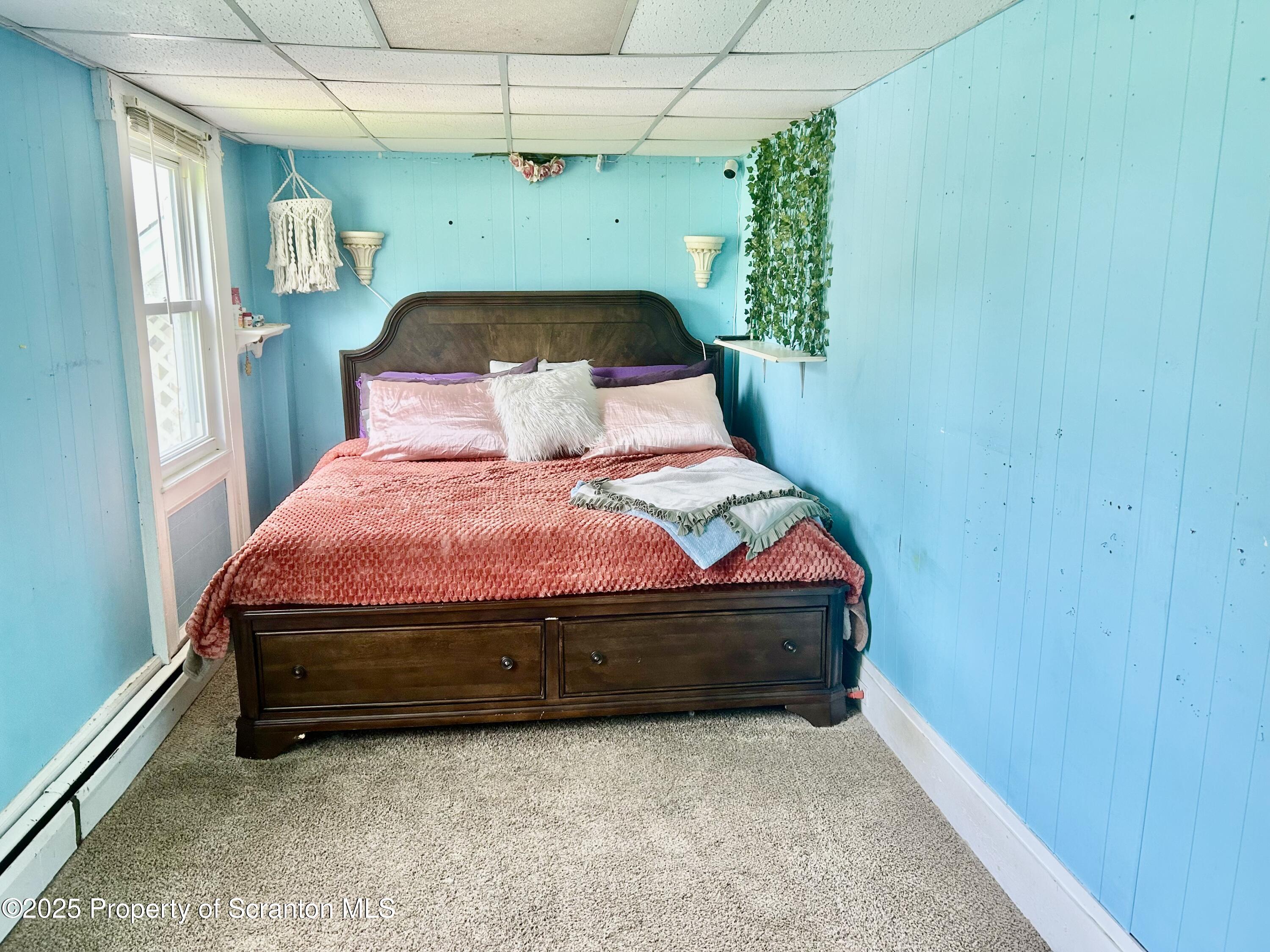 536 Old Rte 11 New Milford, PA 18834 - Photo 15 of 36 a room with bed and a table