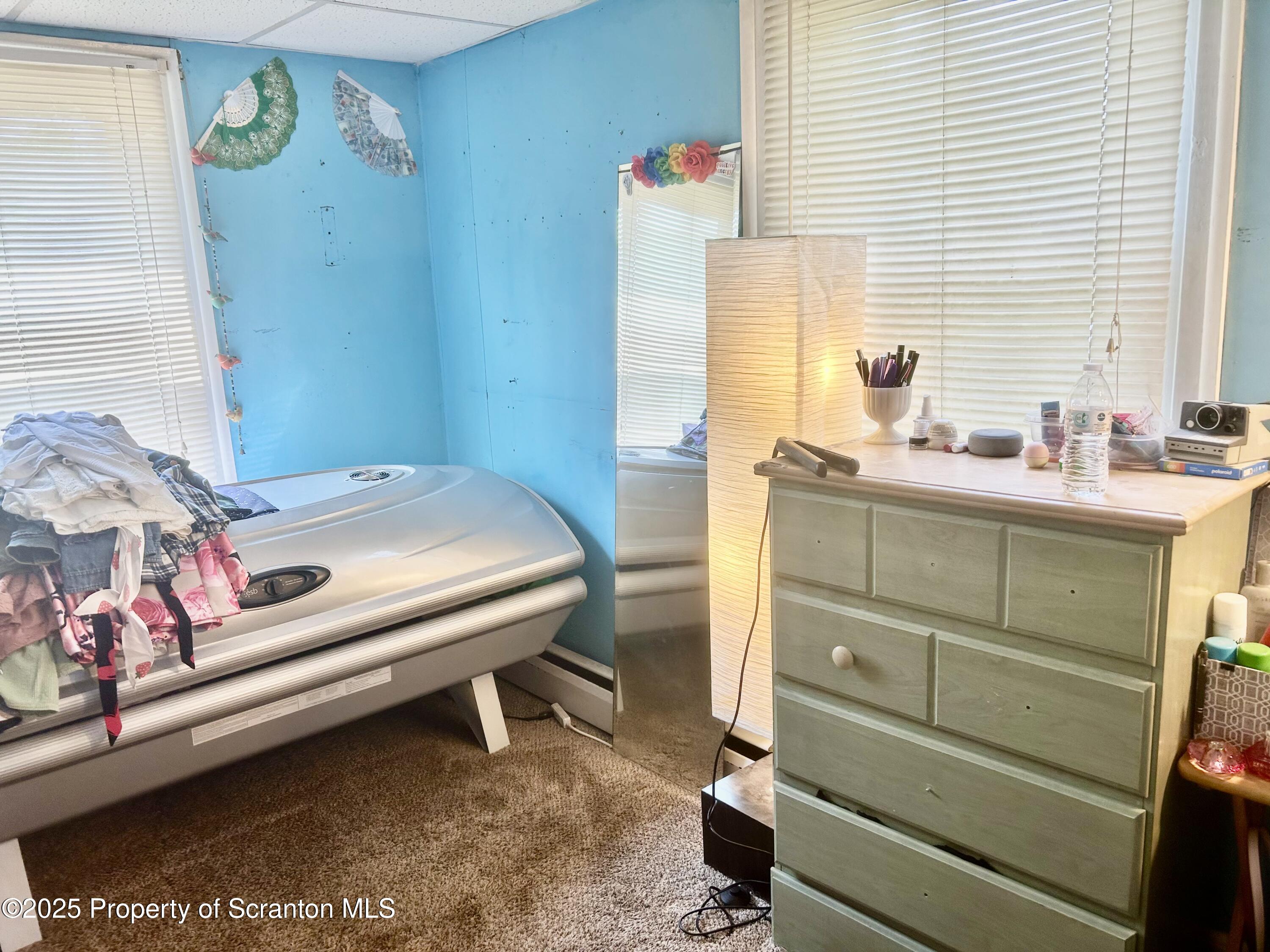 536 Old Rte 11 New Milford, PA 18834 - Photo 17 of 36 a bedroom with a bed and a window