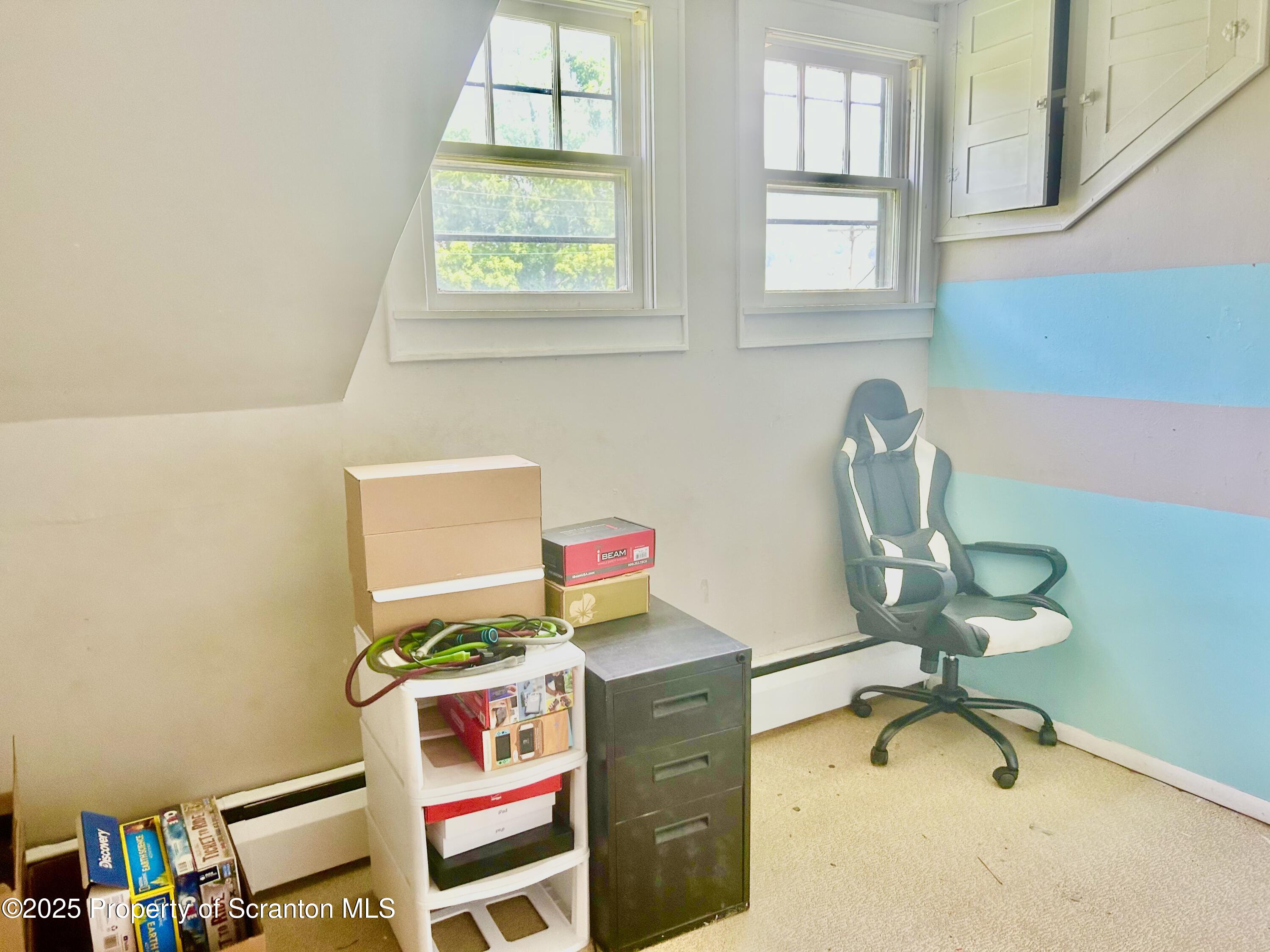 536 Old Rte 11 New Milford, PA 18834 - Photo 22 of 36 a workspace with furniture and a window