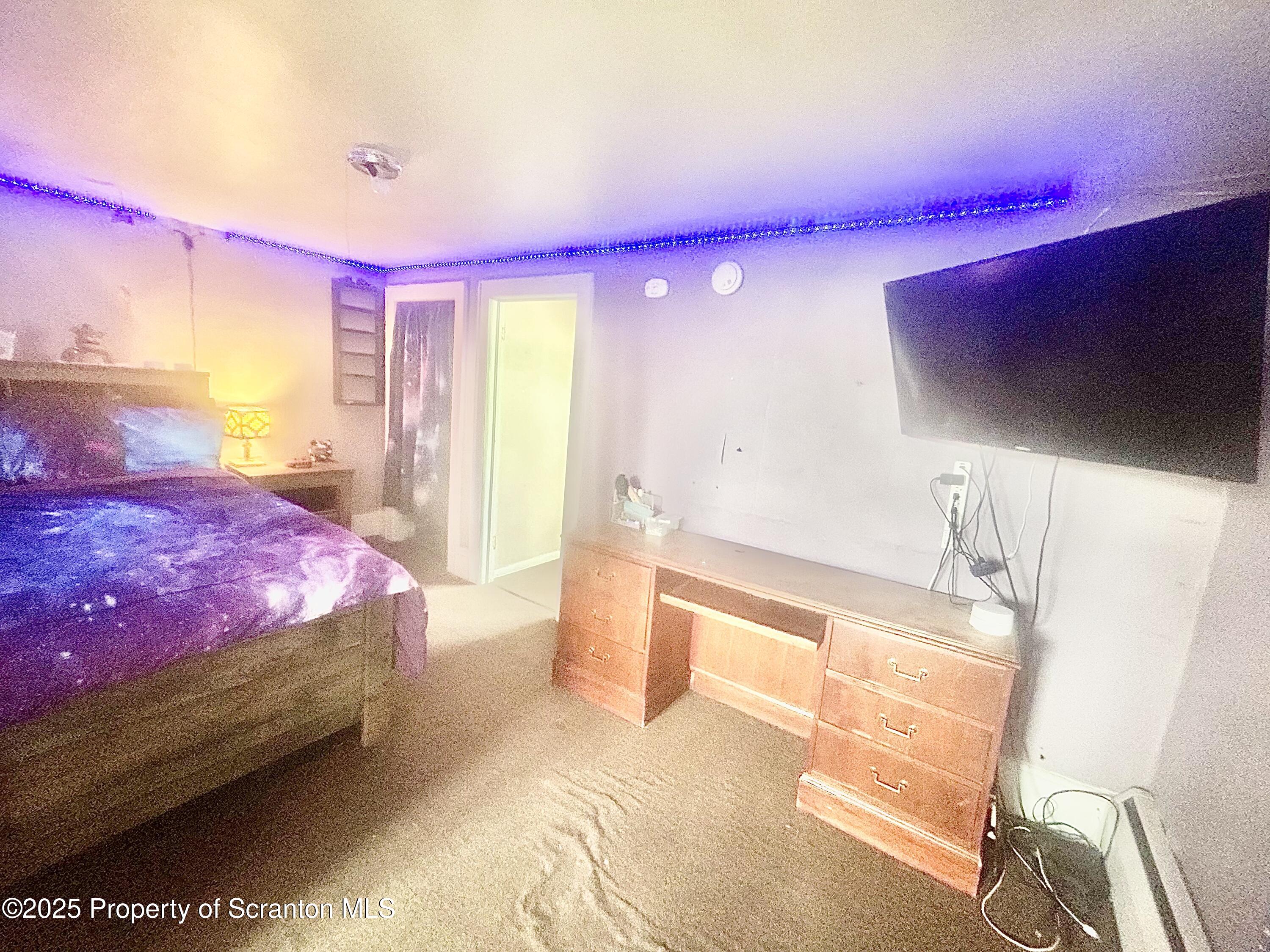 536 Old Rte 11 New Milford, PA 18834 - Photo 25 of 36 a bedroom with a bed and a window