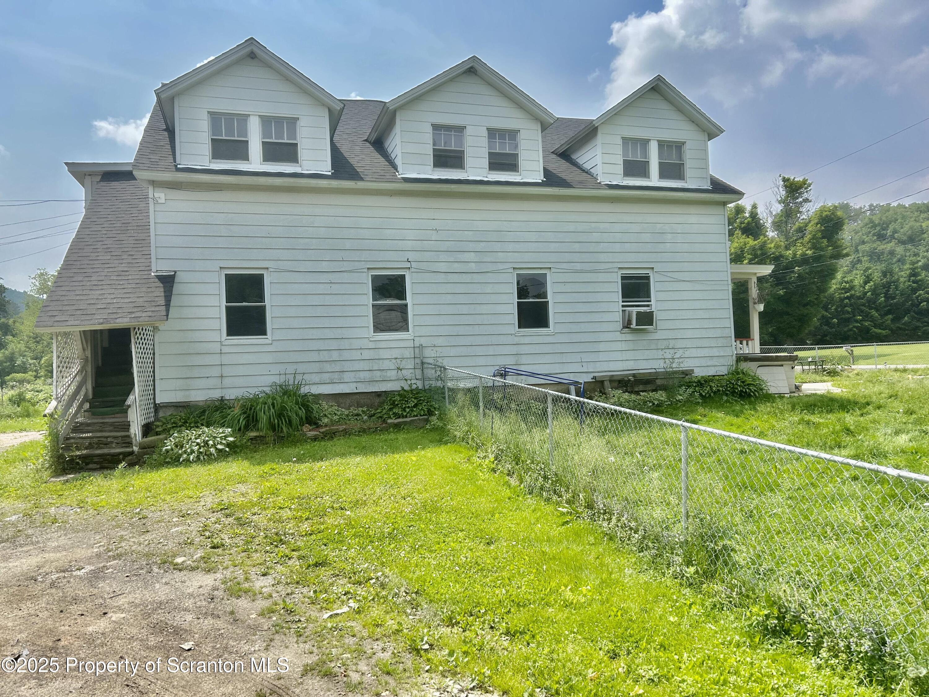 536 Old Rte 11 New Milford, PA 18834 - Photo 32 of 36 a view of a house with a swimming pool