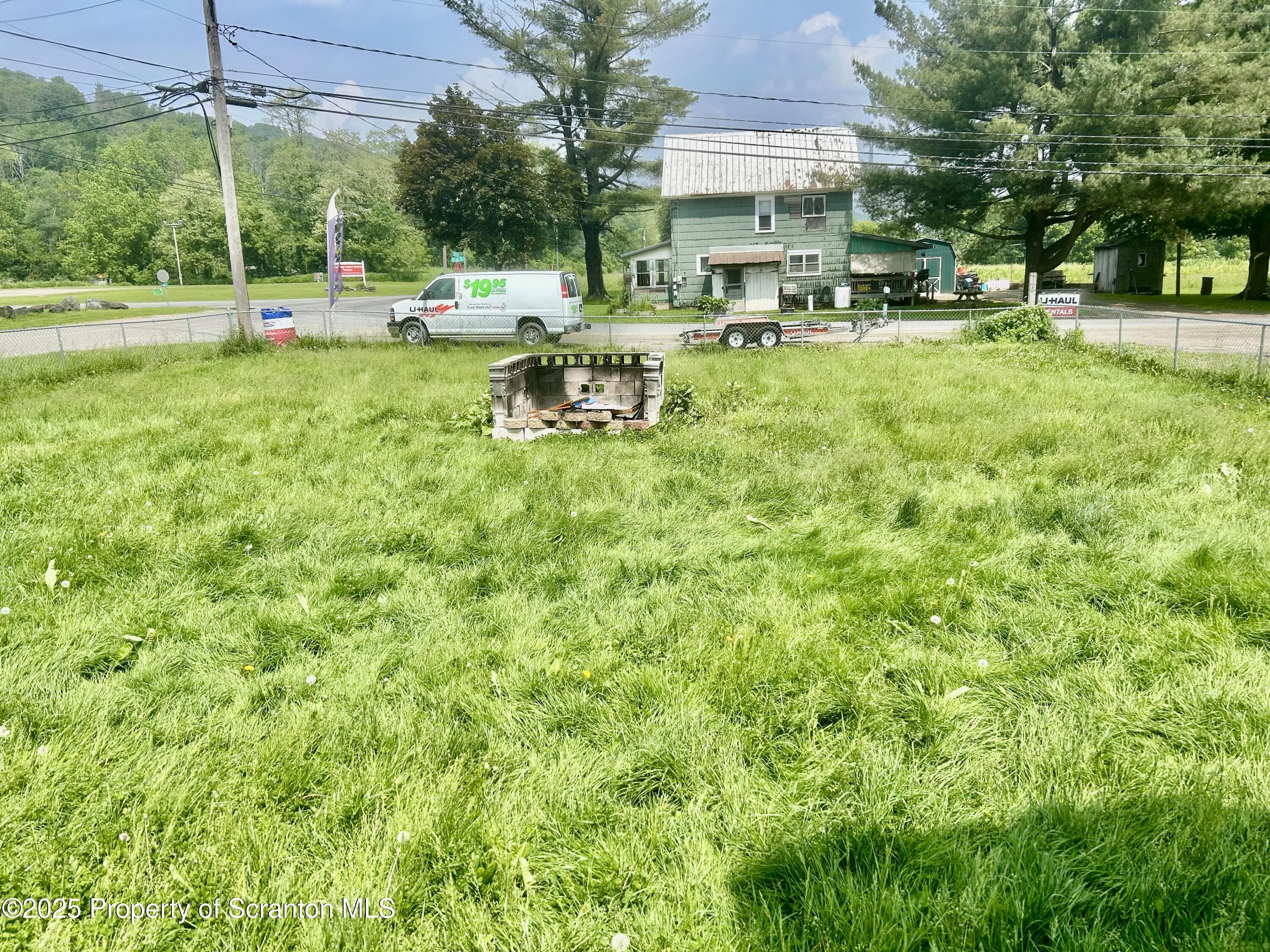 536 Old Rte 11 New Milford, PA 18834 - Photo 36 of 36 a view of backyard with a garden and outdoor seating