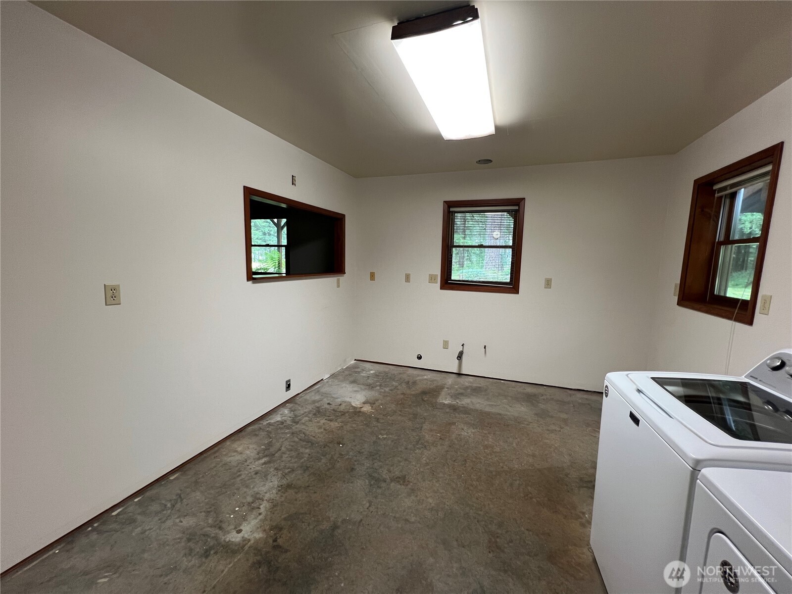 293154 Highway 101 Quilcene, WA 98376 - Photo 19 of 40 a view of a storage & utility room in a room