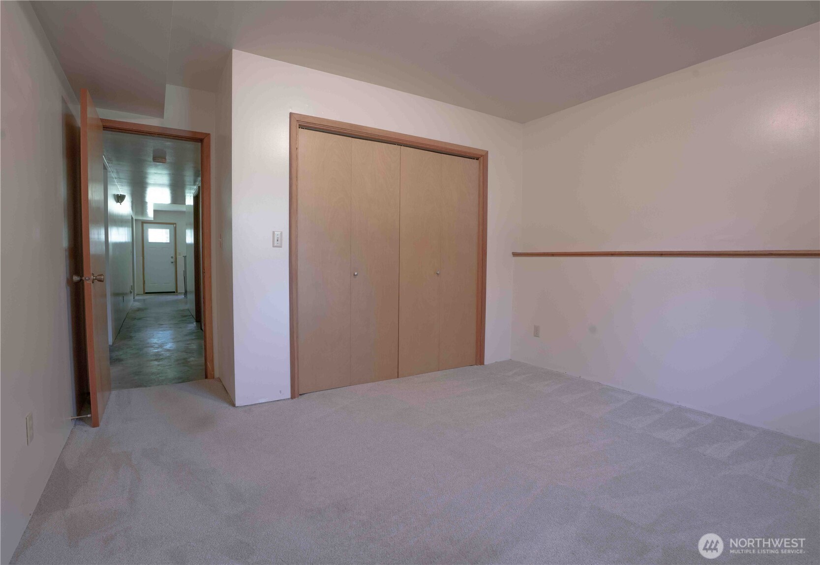 293154 Highway 101 Quilcene, WA 98376 - Photo 27 of 40 an empty room with closet