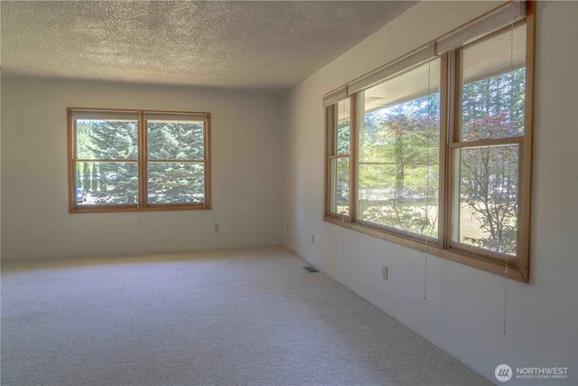 a kitchen with kitchen island a sink stainless steel appliances and cabinets
