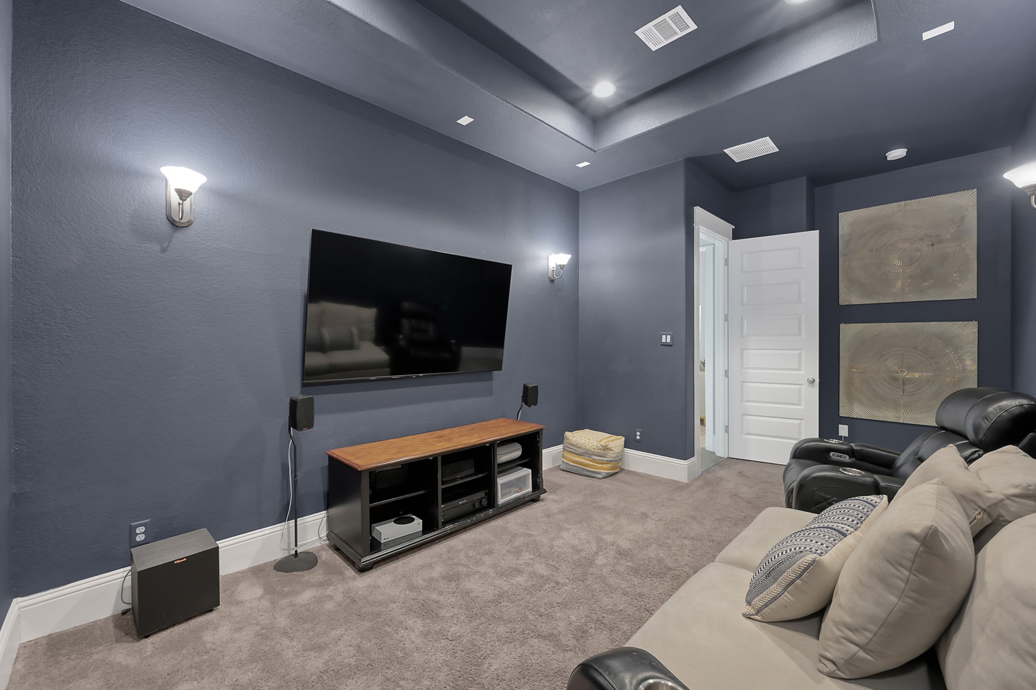 2223 Pintail Lane Conroe, TX 77384 - Photo 11 of 39 Also off the Great Room is a secluded Media Room great for movie nights!